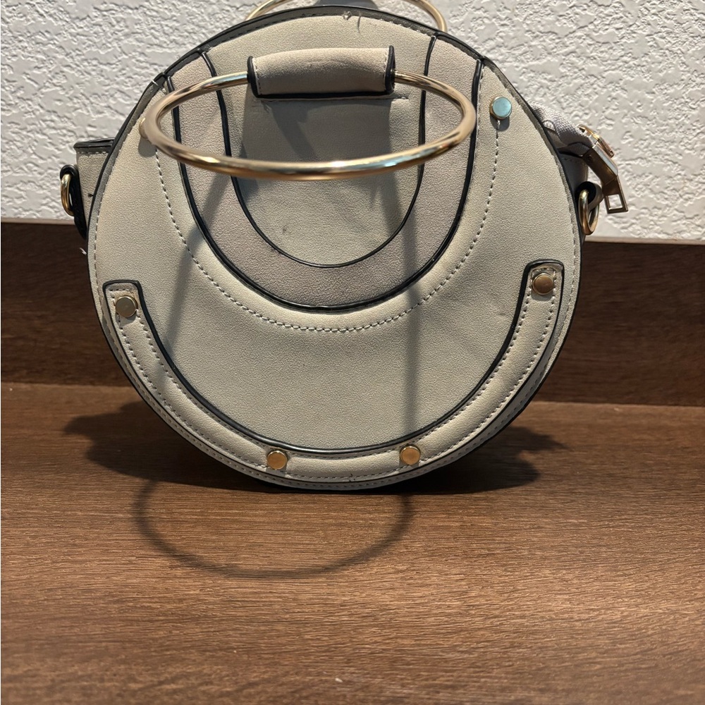 Round Cream Crossbody Bag with Gold Ring Handle